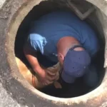 Anxious Old Dog Rescued from City Sewer Has Reunion with His Owner