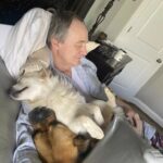 Check Out This Cool Dad Who Naps With the Neighbor’s Dogs